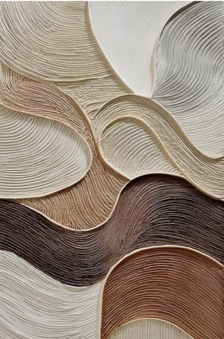 Sculpted plaster texture in warm neutral tones
